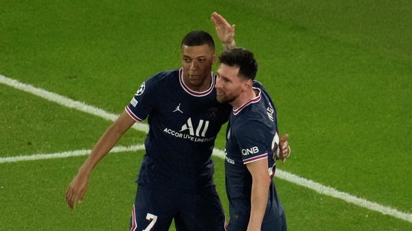 PSG's Lionel Messi, left, celebrates with PSG's Kylian Mbappe after scoring his side's third goal during his Champions League soccer match between Paris Saint Germain and RB Leipzig at the Parc des Princes stadium in Paris, Tuesday, Oct. 19, 2021 - Sputnik International