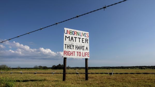 A handmade anti-abortion sign faces a stretch of highway outside of Austin nearly a month after Texas enacted the strictest anti-abortion law in the United States, September, 29, 2021. - Sputnik International