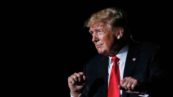 Former U.S. President Donald Trump reacts after his speech during a rally at the Iowa States Fairgrounds in Des Moines, Iowa, U.S., October 9, 2021. - Sputnik International