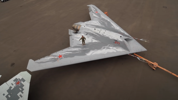 Screengrab of a report on the Okhotnik drone by Zvezda, the official channel of the Russian Defence Ministry. - Sputnik International