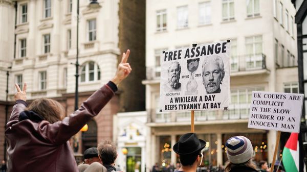 Supporters of WikiLeaks founder Julian Assange hold placards as they gather outside the Royal Courts of Justice, in London, Saturday, Oct. 23, 2021, ahead of next week's extradition case appeal. Supporters of WikiLeaks founder Julian Assange hold placards as they gather outside the Royal Courts of Justice, in London, Saturday, Oct. 23, 2021, ahead of next week's extradition case appeal. - Sputnik International