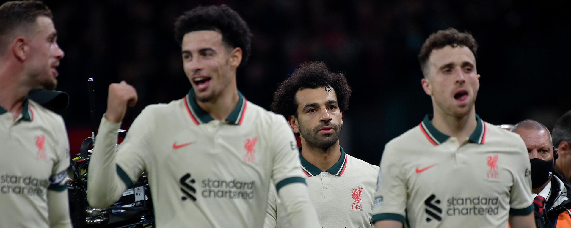 Liverpool's Mohamed Salah, background center, leaves the field with the match ball at the end of the English Premier League soccer match between Manchester United and Liverpool at Old Trafford in Manchester, England, Sunday, Oct. 24, 2021. Liverpool's Mohamed Salah, background center, leaves the field with the match ball at the end of the English Premier League soccer match between Manchester United and Liverpool at Old Trafford in Manchester, England, Sunday, Oct. 24, 2021. - Sputnik International, 1920, 24.10.2021