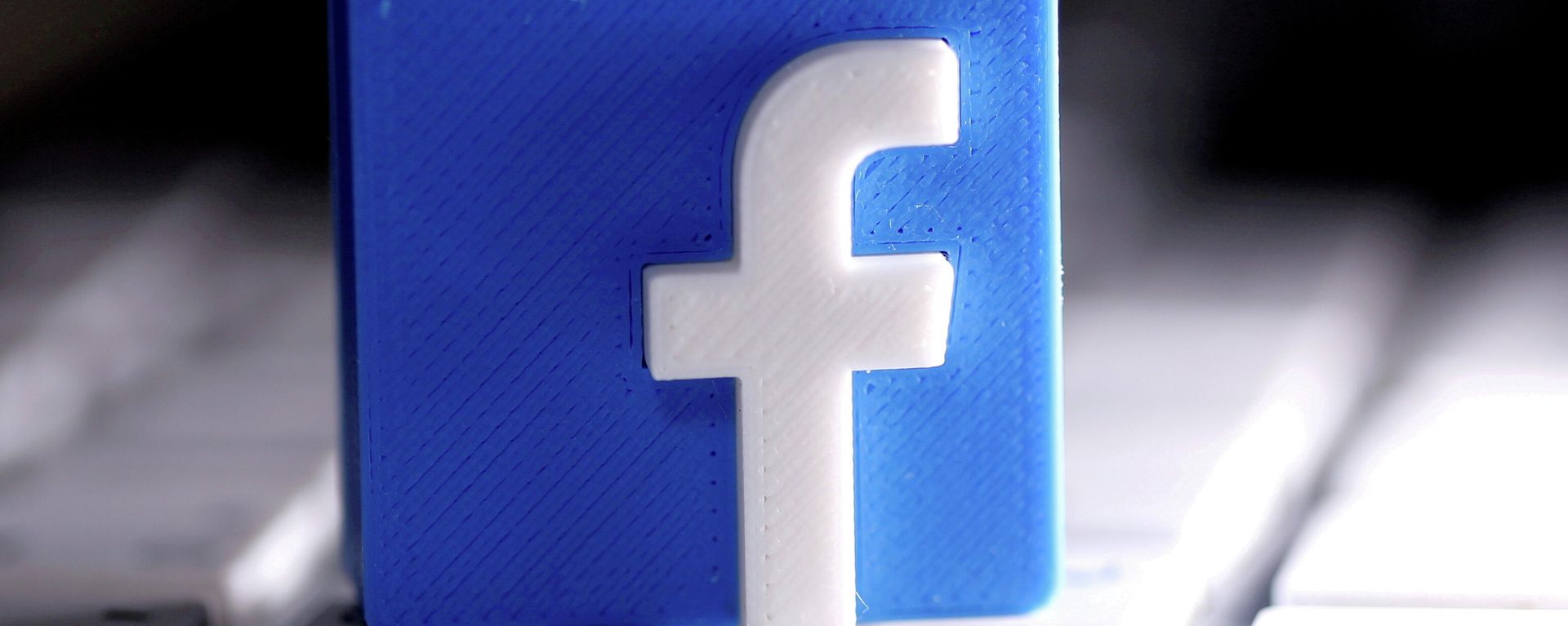 A 3D-printed Facebook logo is seen placed on a keyboard in this illustration taken March 25, 2020. A 3D-printed Facebook logo is seen placed on a keyboard in this illustration taken March 25, 2020. - Sputnik International, 1920, 08.11.2021