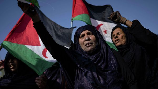 Saharawi refugees attend a rally prior their National Unity Day in the Bujador refugee camp, Algeria, Monday, Oct. 11, 2021. - Sputnik International