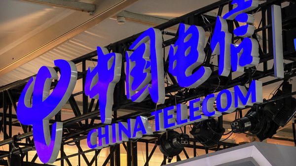  In this Sept. 5, 2020, file photo, the logo for Chinese telecommunications firm China Telecom is seen on a booth at the China International Fair for Trade in Services (CIFTIS) in Beijing - Sputnik International
