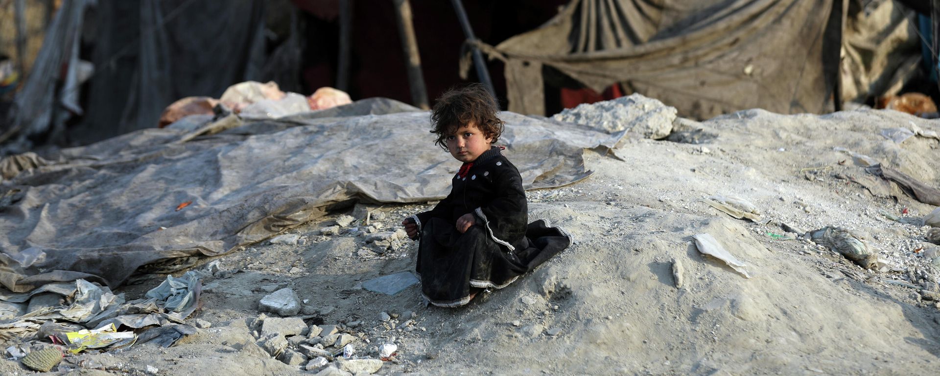 An internally displaced girl poses for a photograph outside her temporary home in the city of Kabul, Afghanistan, Monday, Jan. 18, 2021. An internally displaced girl poses for a photograph outside her temporary home in the city of Kabul, Afghanistan, Monday, Jan. 18, 2021. - Sputnik International, 1920, 22.04.2023