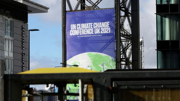 A banner advertising the UN Climate Change Conference (COP26) - Sputnik International
