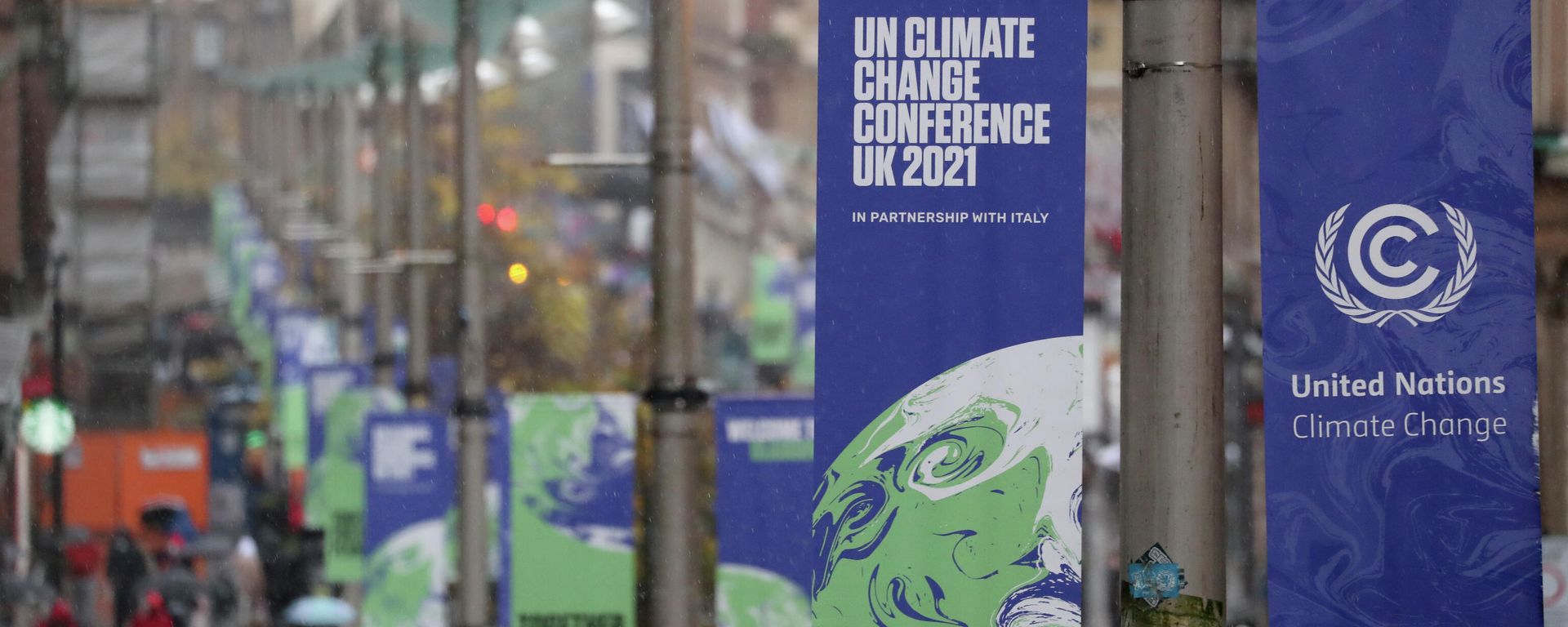 The view of banners displayed in central Glasgow, Scotland, Friday, Oct. 29, 2021. The U.N. climate conference COP26 starts Sunday in Glasgow. The view of banners displayed in central Glasgow, Scotland, Friday, Oct. 29, 2021. The U.N. climate conference COP26 starts Sunday in Glasgow. - Sputnik International, 1920, 31.10.2021