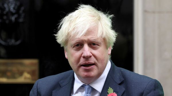 British Prime Minister Boris Johnson meets with fundraisers from the Royal British Legion outside Number 10 Downing Street in London, Britain October 29, 2021. - Sputnik International