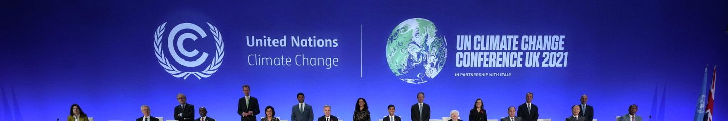 Britain's Chancellor of the Exchequer Rishi Sunak and Mark Carney, British Prime Minister Boris Johnson's Finance Adviser for the UN Climate Change Conference (COP26), pose for a picture with world finance ministers during COP26 in Glasgow, Scotland, Britain, November 3, 2021. Christopher Furlong/Pool via REUTERS - Sputnik International