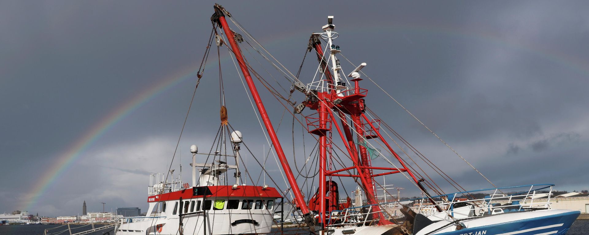 A rainbow appears as British trawler Cornelis Gert Jan is seen moored in the port of Le Havre, after being seized last week?fishing?in the French territorial waters without licence, in Le Havre, France, November 2, 2021 A rainbow appears as British trawler Cornelis Gert Jan is seen moored in the port of Le Havre, after being seized last week?fishing?in the French territorial waters without licence, in Le Havre, France, November 2, 2021 - Sputnik International, 1920, 04.11.2021
