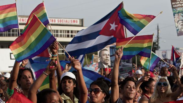LGBT community members march waving representations of Cuba's national flag and rainbow flags during May Day march in Havana, Cuba, Thursday, May 1, 2014. Cuba marks each May Day not with protests but with massive marches organized by workplaces, schools and government. Thousands of islanders filed through Havana's Revolution Plaza on Thursday to a soundtrack of congas, drums and cries of Long live the revolution!  - Sputnik International