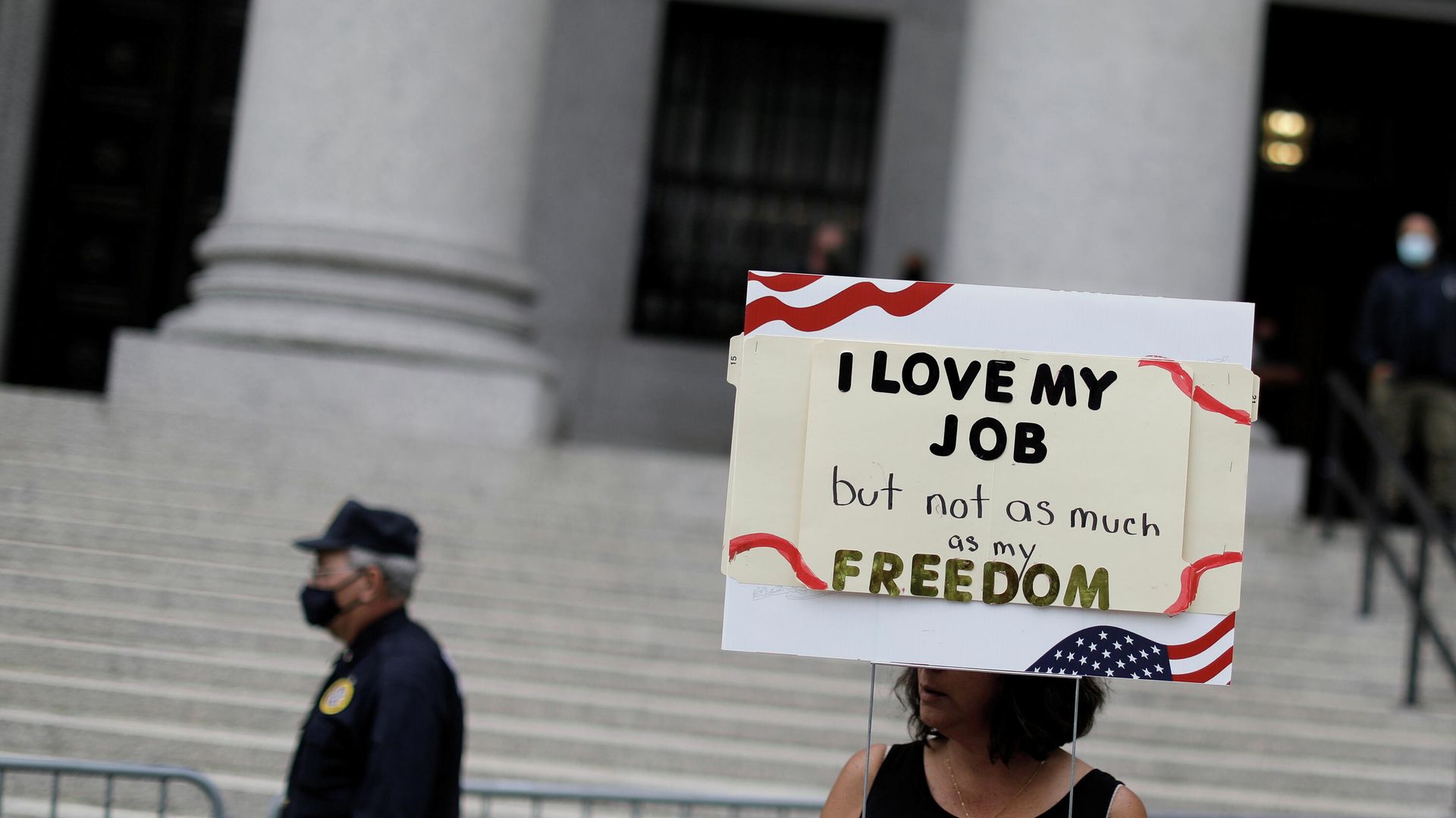 A woman holds a sign as people and teachers protest against NewYork City mandated vaccines against the coronavirus disease (COVID-19) in front of the United States Court in Manhattan in New York City, New York, U.S., October 12, 2021. A woman holds a sign as people and teachers protest against NewYork City mandated vaccines against the coronavirus disease (COVID-19) in front of the United States Court in Manhattan in New York City, New York, U.S., October 12, 2021. - Sputnik International, 1920, 08.11.2021