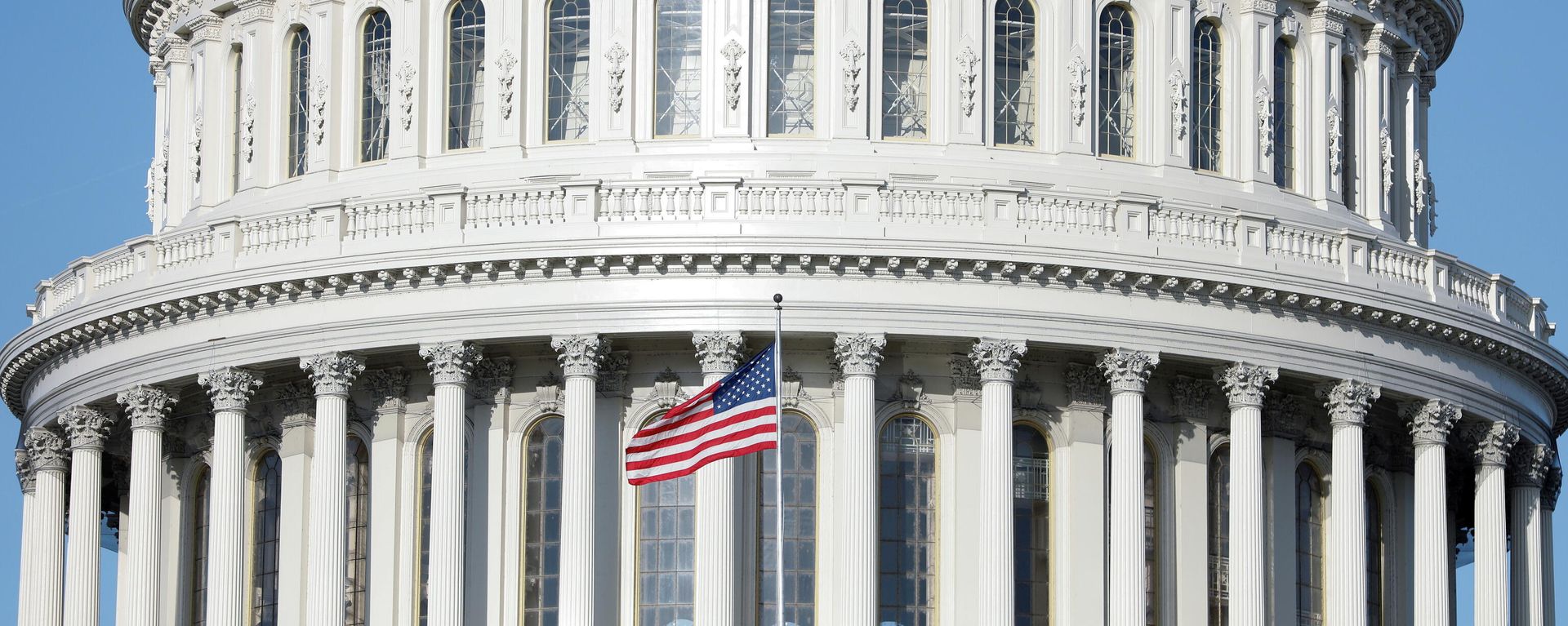 The American Flag flies at the U.S. Capitol Building, as Mayor Muriel Bowser declared a State of Emergency due to the coronavirus disease (COVID-19), on Capitol Hill in Washington, U.S., March 18, 2020. The American Flag flies at the U.S. Capitol Building, as Mayor Muriel Bowser declared a State of Emergency due to the coronavirus disease (COVID-19), on Capitol Hill in Washington, U.S., March 18, 2020. - Sputnik International, 1920, 09.11.2021
