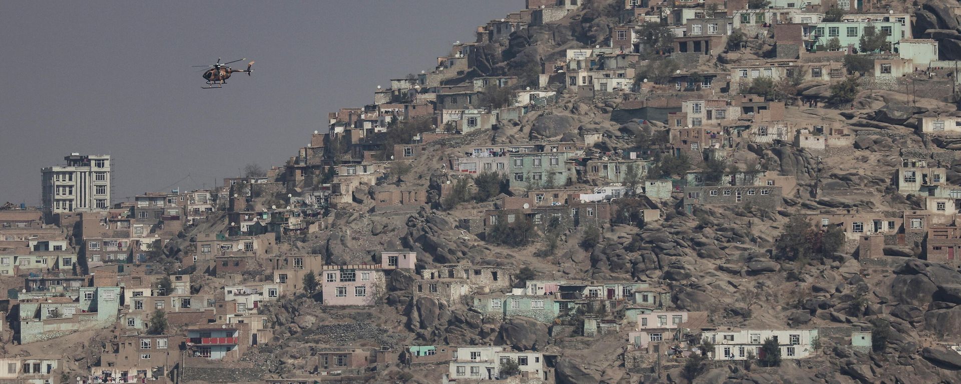 A military helicopter is pictured flying over Kabul, Afghanistan November 4, 2021.REUTERS A military helicopter is pictured flying over Kabul, Afghanistan November 4, 2021.REUTERS - Sputnik International, 1920, 24.11.2021