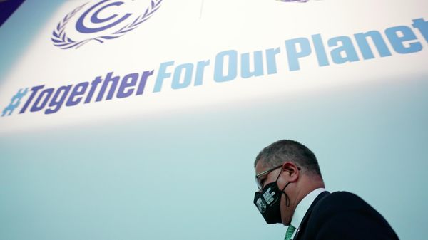 Alok Sharma President of the COP26 summit gets up after a stocktaking plenary session at the COP26 U.N. Climate Summit in Glasgow, Scotland, Saturday, Nov. 13, 2021. Going into overtime, negotiators at U.N. climate talks in Glasgow are still trying to find common ground on phasing out coal, when nations need to update their emission-cutting pledges and, especially, on money. - Sputnik International
