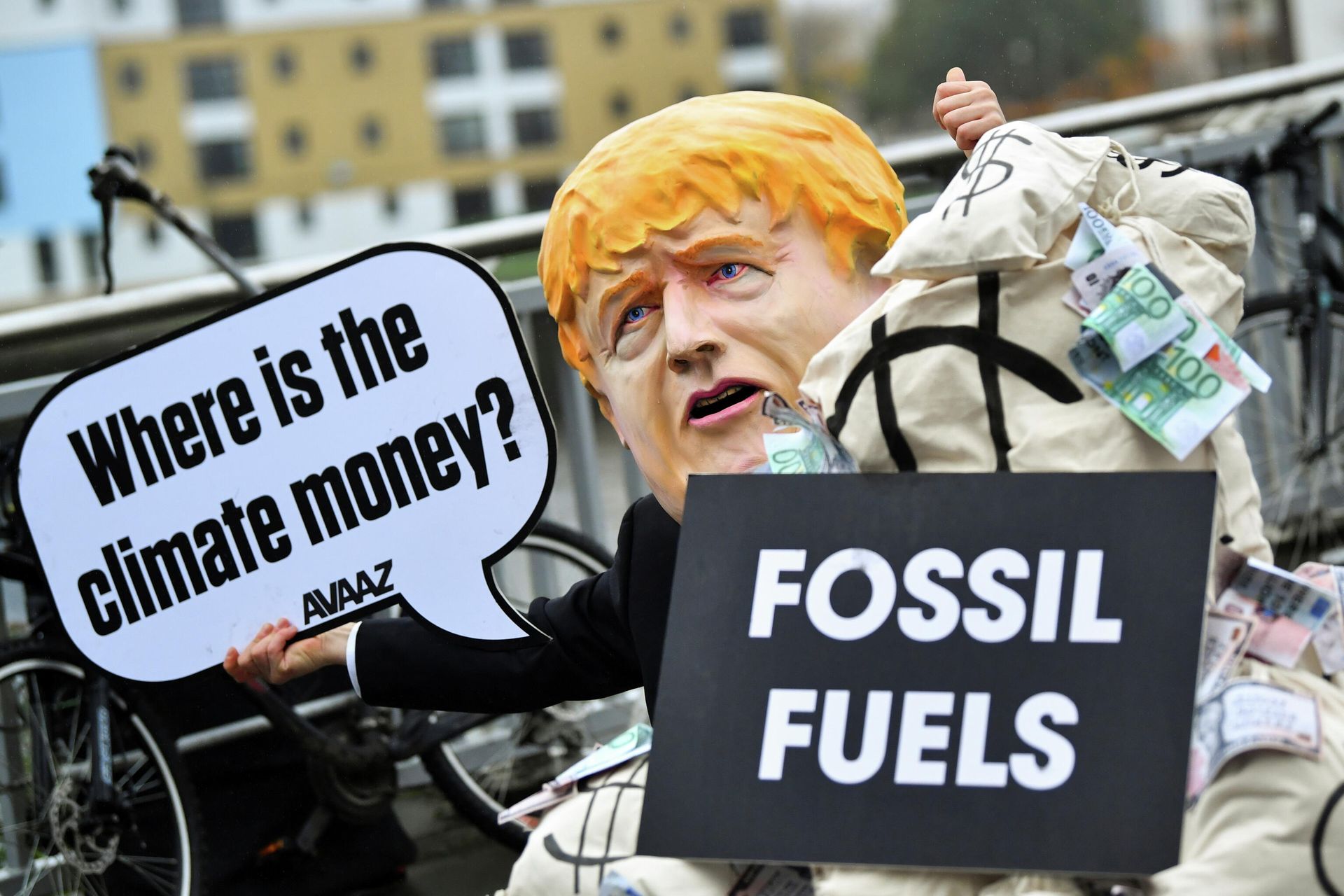 A person wearing a mask depicting Britain's Prime Minister Boris Johnson protests during the UN Climate Change Conference (COP26) in Glasgow, Scotland, Britain November 12, 2021 A person wearing a mask depicting Britain's Prime Minister Boris Johnson protests during the UN Climate Change Conference (COP26) in Glasgow, Scotland, Britain November 12, 2021 - Sputnik International, 1920, 16.11.2021