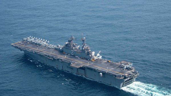 The amphibious assault ship USS Essex (LHD 2) transits the Gulf of Oman, Nov. 9. Essex and the 11th Marine Expeditionary Unit are deployed to the U.S. 5th Fleet area of operations in support of naval operations to ensure maritime stability and security in the Central Region, connecting the Mediterranean and the Pacific through the western Indian Ocean and three strategic choke points. - Sputnik International