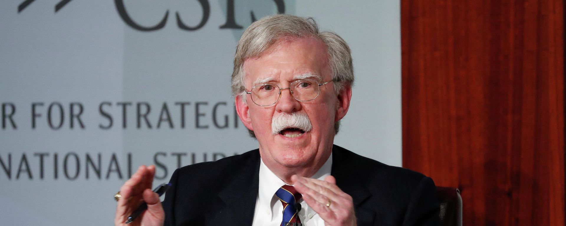 In this Sept. 30, 2019, file photo, former National security adviser John Bolton gestures while speakings at the Center for Strategic and International Studies in Washington. In this Sept. 30, 2019, file photo, former National security adviser John Bolton gestures while speakings at the Center for Strategic and International Studies in Washington. - Sputnik International, 1920, 24.02.2023