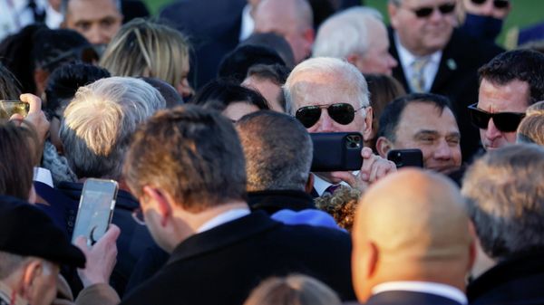 U.S. President Joe Biden celebrates with lawmakers and guests after signing the Infrastructure Investment and Jobs Act on the South Lawn at the White House in Washington, U.S. November 15, 2021. - Sputnik International