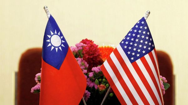 Flags of Taiwan and U.S. are placed for a meeting in Taipei, Taiwan March 27, 2018. - Sputnik International