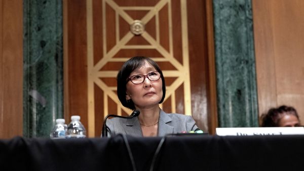 Saule Omarova, President Biden's nominee to head the Office of the Comptroller of the Currency, answers a question from a Senator during a hearing with the Senate Banking Committee at the U.S. Capitol in Washington, U.S., November 18, 2021. - Sputnik International