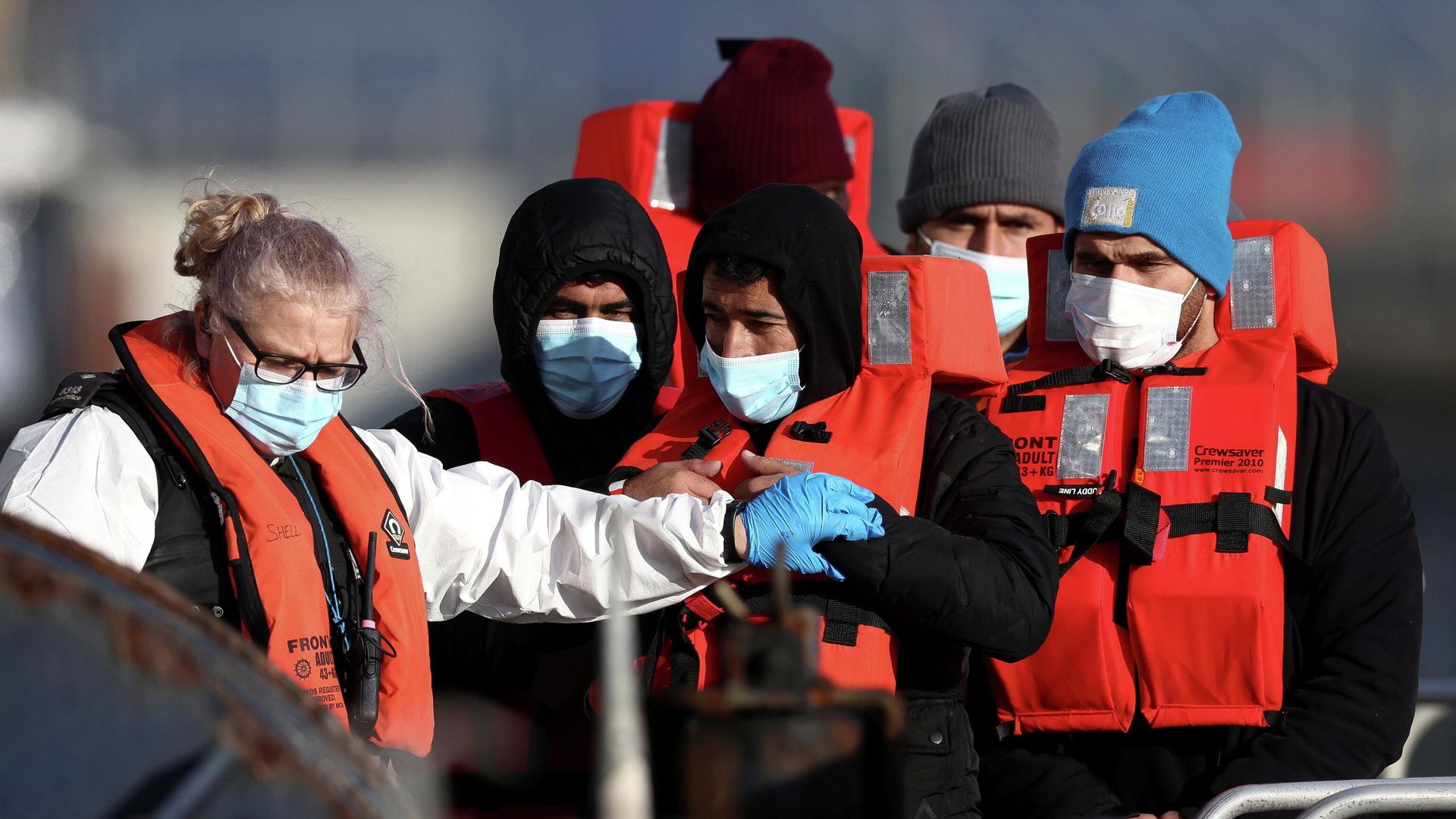 Migrants are escorted by Border Force staff into Dover harbour after crossing the channel in Dover, Britain, November 18, 2021 Migrants are escorted by Border Force staff into Dover harbour after crossing the channel in Dover, Britain, November 18, 2021 - Sputnik International, 1920, 23.11.2021