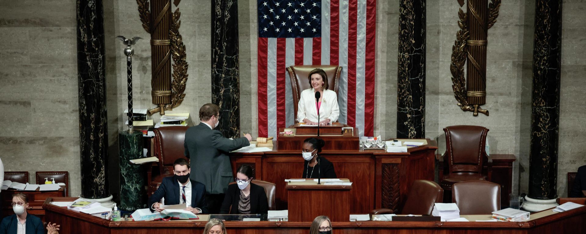 Speaker of the House Nancy Pelosi (D-CA) presides over the vote for the Build Back Better Act at the U.S. Capitol on November 19, 2021 in Washington, DC. The vote, which passed 220-213, comes after House Minority Leader Kevin McCarty (D-CA) spoke overnight for more than eight hours in an attempt to convince colleagues not to support the $1.75 trillion social spending bill. The key Biden Administration legislation is the result of months of negotiations between the White House and moderate and progressive House Democrats. Speaker of the House Nancy Pelosi (D-CA) presides over the vote for the Build Back Better Act at the U.S. Capitol on November 19, 2021 in Washington, DC. The vote, which passed 220-213, comes after House Minority Leader Kevin McCarty (D-CA) spoke overnight for more than eight hours in an attempt to convince colleagues not to support the $1.75 trillion social spending bill. The key Biden Administration legislation is the result of months of negotiations between the White House and moderate and progressive House Democrats. - Sputnik International, 1920, 19.11.2021