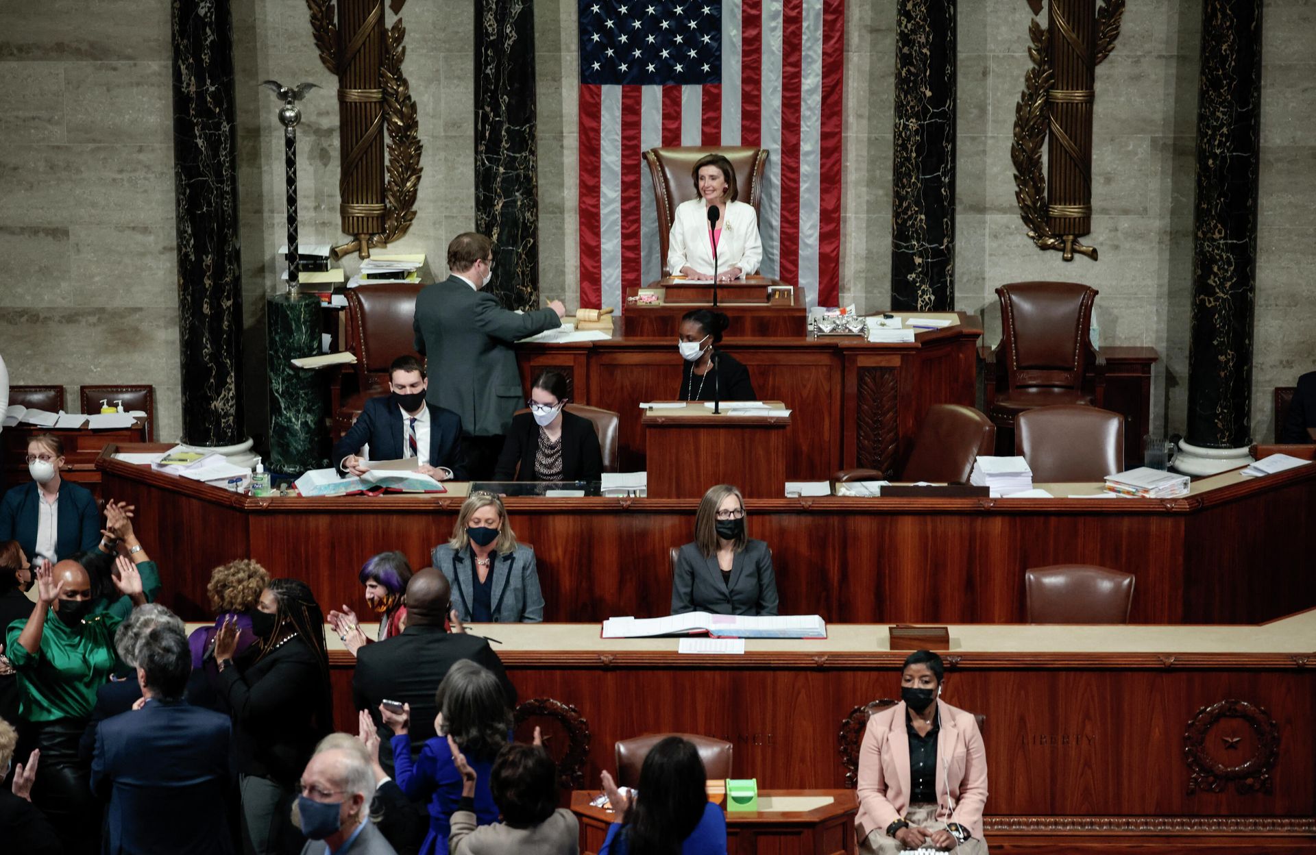 Speaker of the House Nancy Pelosi (D-CA) presides over the vote for the Build Back Better Act at the U.S. Capitol on November 19, 2021 in Washington, DC. The vote, which passed 220-213, comes after House Minority Leader Kevin McCarty (D-CA) spoke overnight for more than eight hours in an attempt to convince colleagues not to support the $1.75 trillion social spending bill. The key Biden Administration legislation is the result of months of negotiations between the White House and moderate and progressive House Democrats. - Sputnik International, 1920, 23.11.2021