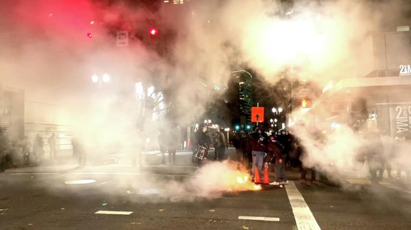A fire burns on the street during protests after the not guilty verdict was announced in the trial of Kyle Rittenhouse, in Portland, Oregon, U.S., November 19, 2021 in this still image obtained from a social media video - Sputnik International