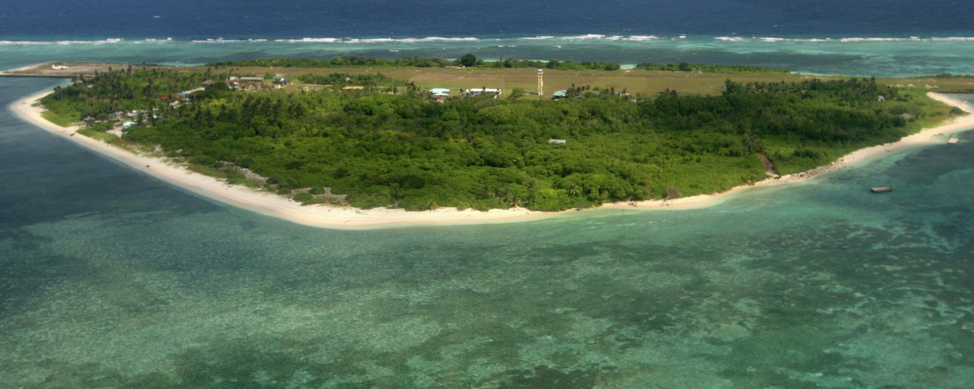 FILE - This July 20, 2011, file photo shows an aerial view of Pag-asa Island, part of the disputed Spratly group of islands, in the South China Sea located off the coast of western Philippines FILE - This July 20, 2011, file photo shows an aerial view of Pag-asa Island, part of the disputed Spratly group of islands, in the South China Sea located off the coast of western Philippines - Sputnik International, 1920, 15.01.2024