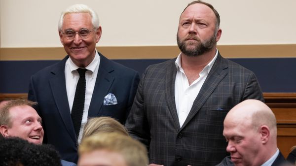 Roger Stone, a confidant of President Donald Trump, left, and radio show host and conspiracy theorist Alex Jones, right, enter the House Judiciary Committee hearing room to hear testimony by Google CEO Sundar Pichai, on Capitol Hill in Washington, Tuesday, Dec. 11, 2018. - Sputnik International