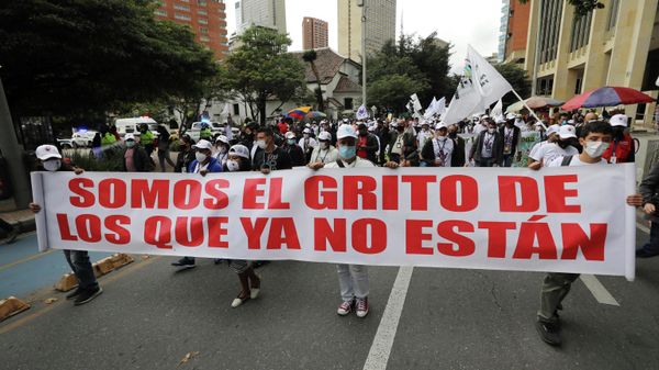 Ex-combatants of the disbanded FARC and social activists march to demand the government guarantee their right to life and compliance with the 2016 peace agreement, in Bogota, Colombia, Sunday, Nov. 1, 2020. The mobilization coined Pilgrimage for Life and Peace is motivated by the murders of ex-combatants after the peace process. - Sputnik International