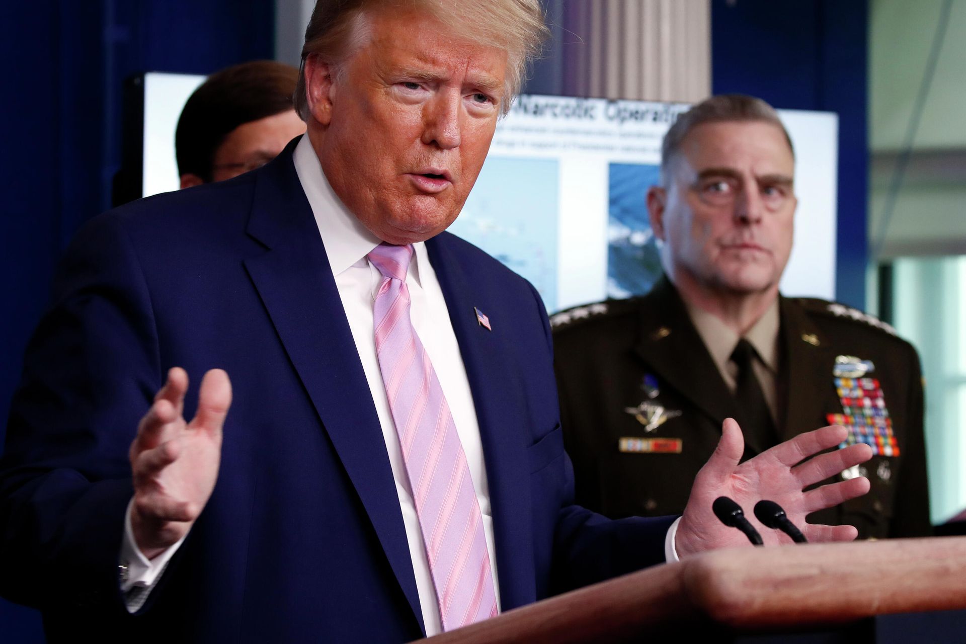 President Donald Trump speaks about the coronavirus in the James Brady Press Briefing Room of the White House, Wednesday, April 1, 2020, in Washington, as Chairman of the Joint Chiefs Gen. Mark Milley, listens. President Donald Trump speaks about the coronavirus in the James Brady Press Briefing Room of the White House, Wednesday, April 1, 2020, in Washington, as Chairman of the Joint Chiefs Gen. Mark Milley, listens. - Sputnik International, 1920, 06.12.2021