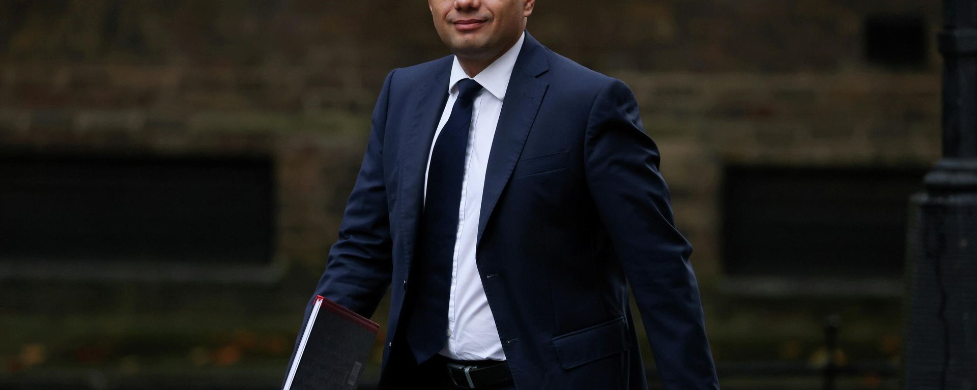 Britain's Health Secretary Sajid Javid walks outside Downing Street in London, Britain, October 29, 2021 Britain's Health Secretary Sajid Javid walks outside Downing Street in London, Britain, October 29, 2021 - Sputnik International, 1920, 28.11.2021