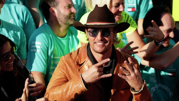Matthew McConaughey celebrates with the Mercedes crew following the Formula One U.S. Grand Prix auto race at the Circuit of the Americas, Sunday, Nov. 3, 2019, in Austin, Texas. - Sputnik International