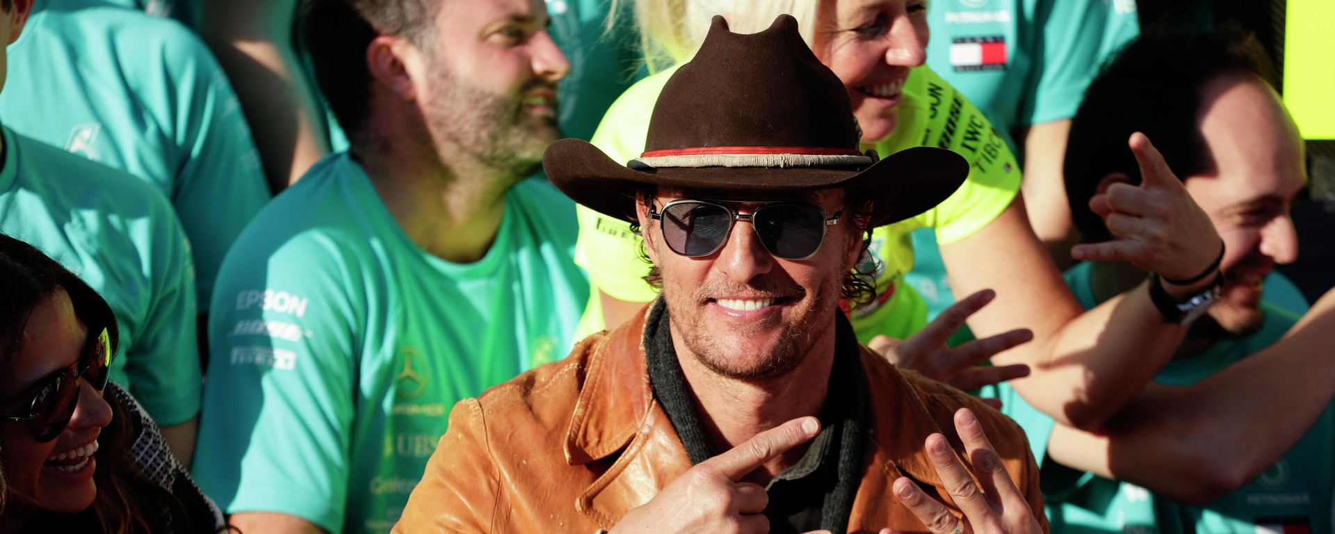 Matthew McConaughey celebrates with the Mercedes crew following the Formula One U.S. Grand Prix auto race at the Circuit of the Americas, Sunday, Nov. 3, 2019, in Austin, Texas. Matthew McConaughey celebrates with the Mercedes crew following the Formula One U.S. Grand Prix auto race at the Circuit of the Americas, Sunday, Nov. 3, 2019, in Austin, Texas. - Sputnik International, 1920, 29.11.2021