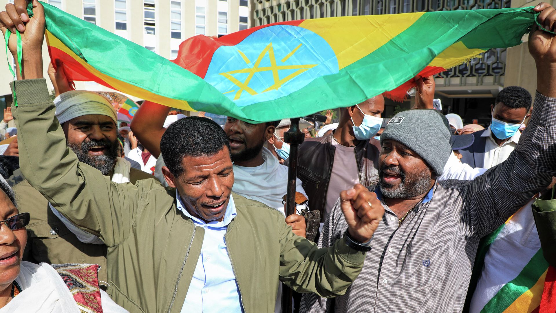 Ethiopian distance-running great Haile Gebrselassie, left, attends an event in support the country's military forces, in front of the city hall in Addis Ababa, Ethiopia Saturday, Nov. 27, 2021. Ethiopian artists and performers gathered at the event before they were expected to travel out of the capital to perform for military forces in the field of the country’s yearlong war against Tigray forces. Ethiopian distance-running great Haile Gebrselassie, left, attends an event in support the country's military forces, in front of the city hall in Addis Ababa, Ethiopia Saturday, Nov. 27, 2021. Ethiopian artists and performers gathered at the event before they were expected to travel out of the capital to perform for military forces in the field of the country’s yearlong war against Tigray forces. - Sputnik International, 1920, 29.11.2021
