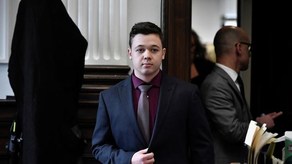 Kyle Rittenhouse walks during his trial at the Kenosha County Courthouse in Kenosha, Wisconsin, U.S., November 19, 2021. - Sputnik International