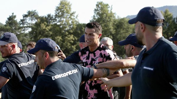 Juventus' Portuguese forward Cristiano Ronaldo leaves the field as invaders run onto the pitch after the friendly football match between Juventus A and Juventus B in Villar Perosa, on August 14, 2019 - Sputnik International