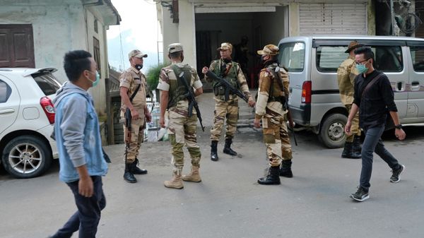 Security officers wearing face masks as a preventive measure against the coronavirus keep guard near a polling booth during by-elections in Kohima, capital of the northeastern Indian state of Nagaland, Tuesday, Nov. 3, 2020. Security officers wearing face masks as a preventive measure against the coronavirus keep guard near a polling booth during by-elections in Kohima, capital of the northeastern Indian state of Nagaland, Tuesday, Nov. 3, 2020. - Sputnik International