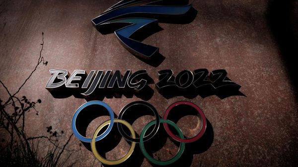 The Beijing 2022 logo is seen outside the headquarters of the Beijing Organising Committee for the 2022 Olympic and Paralympic Winter Games in Shougang Park, the site of a former steel mill, in Beijing, China, November 10, 2021 - Sputnik International