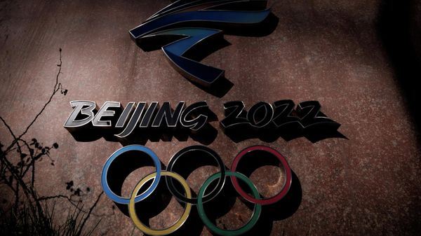 The Beijing 2022 logo is seen outside the headquarters of the Beijing Organising Committee for the 2022 Olympic and Paralympic Winter Games in Shougang Park, the site of a former steel mill, in Beijing, China, November 10, 2021. - Sputnik International
