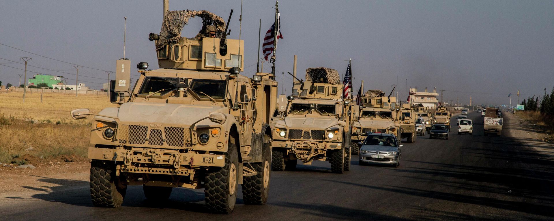 U.S. military convoy drives near the town of Qamishli, north Syria, Saturday, Oct. 26. 2019 - Sputnik International, 1920, 08.11.2023