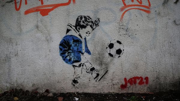 A mural of Arthur Labinjo-Hughes, created by graffiti artist Disney, is painted on a wall in Aston - Sputnik International