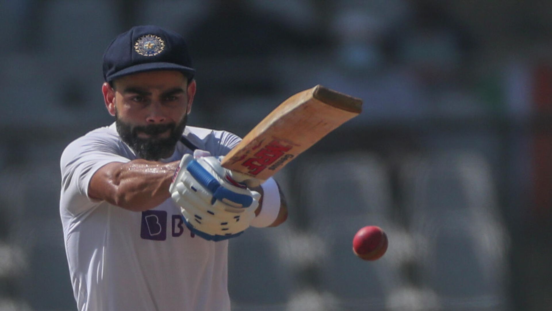 India's captain Virat Kohli plays shot during the day three of their second test cricket match with New Zealand in Mumbai, India, Sunday, Dec. 5, 2021 India's captain Virat Kohli plays shot during the day three of their second test cricket match with New Zealand in Mumbai, India, Sunday, Dec. 5, 2021 - Sputnik International, 1920, 10.12.2021