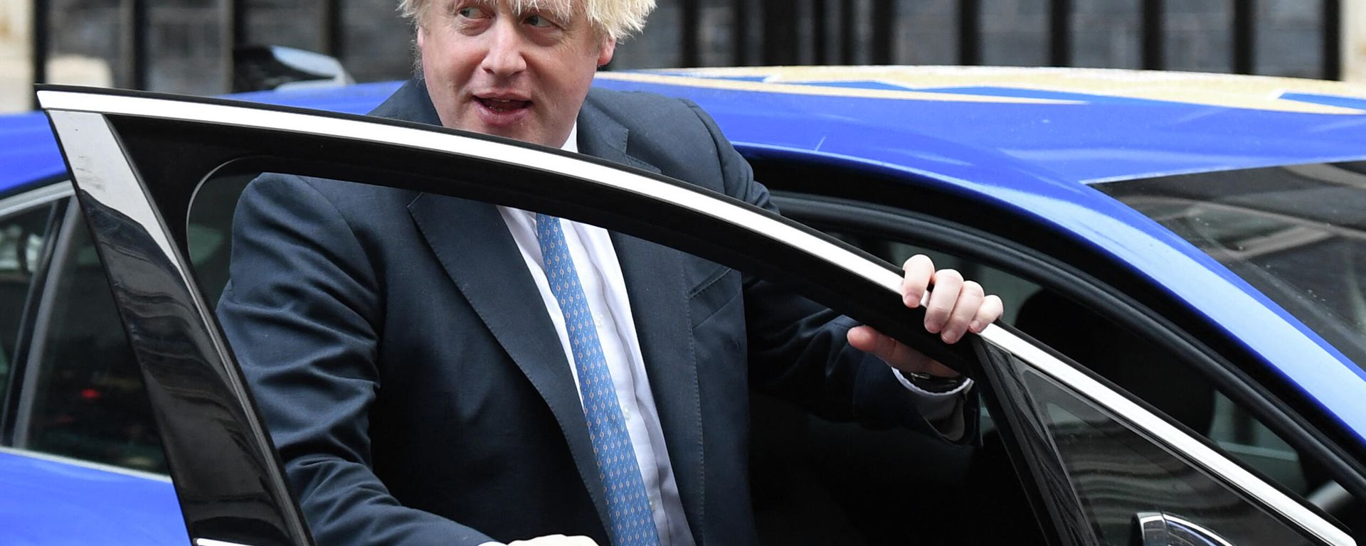 Britain's Prime Minister Boris Johnson gets into an electric vehicle during a meeting with Small Business Saturday entrepreneurs in Downing Street in central London on December 1, 2021 Britain's Prime Minister Boris Johnson gets into an electric vehicle during a meeting with Small Business Saturday entrepreneurs in Downing Street in central London on December 1, 2021 - Sputnik International, 1920, 13.12.2021