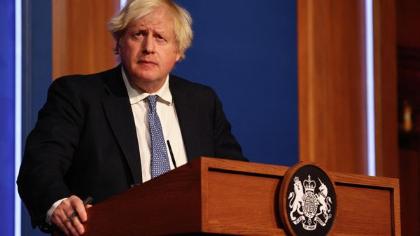 Britain's Prime Minister Boris Johnson holds a press conference for the latest Covid-19 update in the Downing Street briefing room in central London on December 8, 2021 Britain's Prime Minister Boris Johnson holds a press conference for the latest Covid-19 update in the Downing Street briefing room in central London on December 8, 2021 - Sputnik International