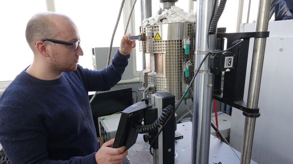 Researcher at the Laboratory of Volumetric Nanostructural Materials, NRU BelSU, Candidate of Technical Sciences Yurchenko Nikita Yuryevich. Investigation of mechanical properties of the developed refractory high-entropy alloy at elevated temperatures using a universal testing machine Instron-300LX - Sputnik International