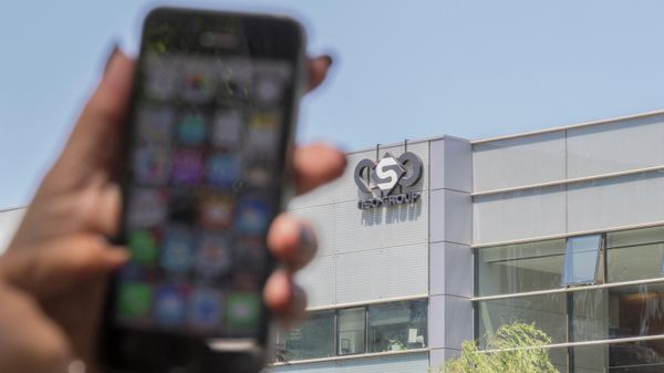 An Israeli woman uses her iPhone in front of the building housing the Israeli NSO group, on August 28, 2016, in Herzliya, near Tel Aviv. - Apple iPhone owners, earlier in the week, were urged to install a quickly released security update after a sophisticated attack on an Emirati dissident exposed vulnerabilities targeted by cyber arms dealers.
Lookout and Citizen Lab worked with Apple on an iOS patch to defend against what was called Trident because of its triad of attack methods, the researchers said in a joint blog post.
Trident is used in spyware referred to as Pegasus, which a Citizen Lab investigation showed was made by an Israel-based organization called NSO Group. - Sputnik International